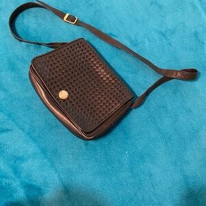 Sleek Black Woven Crossbody Bag with Gold Detail